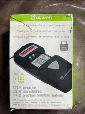RARE FINE All-in-one battery charger for Mobile Phones, Cameras, and Camcorders